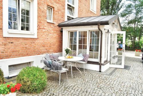 Фотография мини отеля American House Hennela