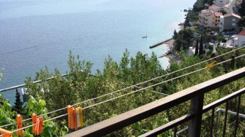 Фотография гостевого дома Apartments with a parking space Mimice, Omis - 11045