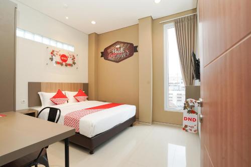 Фотография гостиницы Vaccinated Staff - OYO 614 Graha 8 Syariah