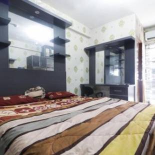 Фотографии гостиницы 
            Jo Rooms - Apartemen Betos