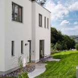 Фотография гостевого дома die Strandhäuser - Leuchtfeuer