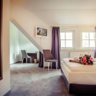 Фотографии гостиницы
Hotel am Rugard