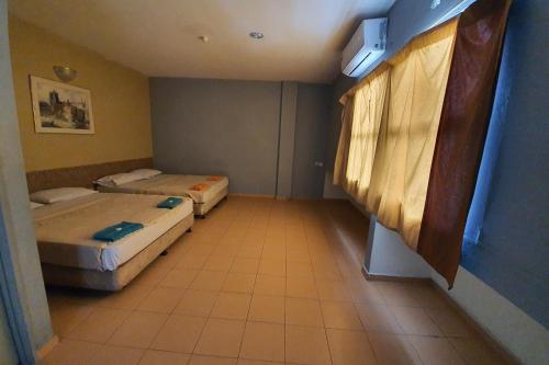 Фотография гостиницы OYO 89676 Hotel 22