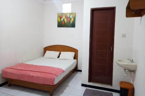 Фотография гостиницы OYO 3042 Griya Karangsalam Indah