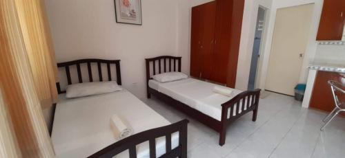 Фотография гостиницы Vaccinated Staff-OYO 556 3j's And K Apartment