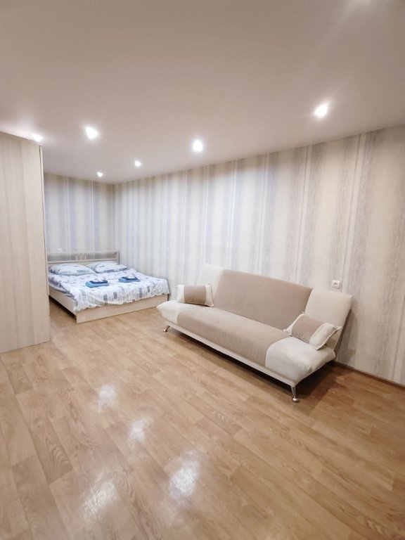 Фотография квартиры Апартаменты Уютная Квартира с Видом на Город