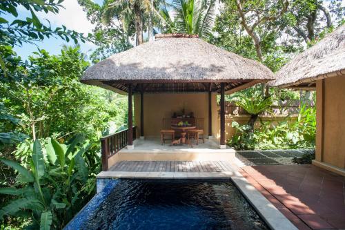 Фотография гостиницы Komaneka at Monkey Forest Ubud