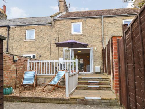 Фотографии гостевого дома 
            7 Coastal Cottages