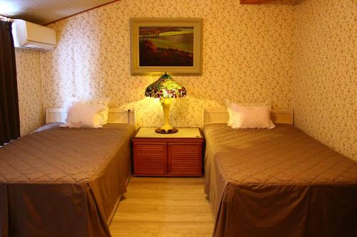 Фотография мини отеля カフェロッジ Touch Wood