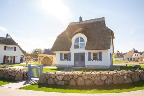 Фотография гостевого дома Ferienhaus Schilfrohrsaenger 30