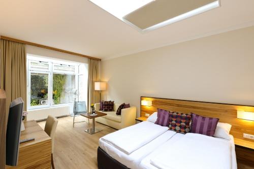 Фотография гостиницы Das Jedermann Boutiquehotel mit Stadtgarten