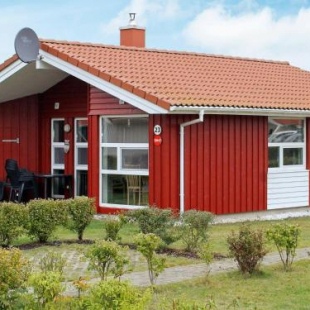 Фотография гостевого дома Two-Bedroom Holiday home in Grömitz 1