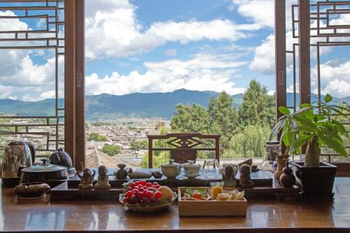 Фотография мини отеля Lijiang Lize Graceland Merry Inn