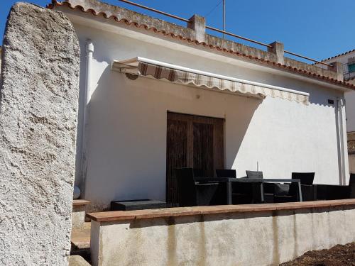 Фотография гостевого дома 2 bedrooms house at Palamos 100 m away from the beach with enclosed garden and wifi