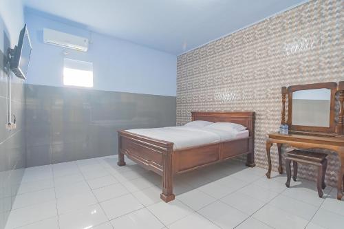 Фотография гостевого дома RedDoorz near Sentani Airport Jayapura