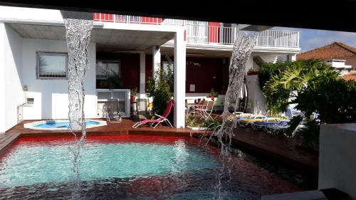 Фотография гостевого дома The Wishing Well Country House