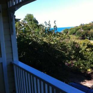 Фотографии гостевого дома 
            Calabash Cottage