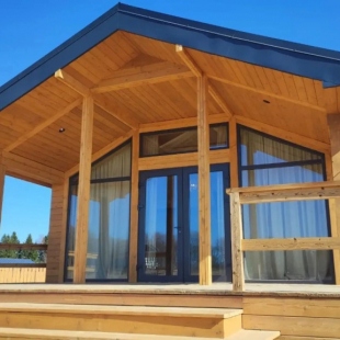 Фотография Коттеджа Коттедж Экоранчо Лодж-студия с панорамной ванной и сауной