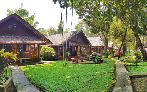 Фотография гостиницы Mutiara Carita Cottages