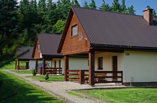 Фотография гостевого дома Domki Pod Lasem