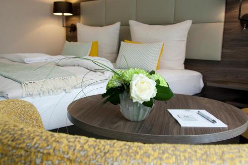 Фотография гостиницы Hotel Am Moosrain Garni