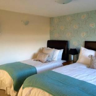 Фотографии мини отеля
Fourwinds B&B