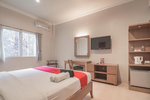 Фотография гостевого дома RedDoorz Plus Syariah near Stasiun Tegal 2