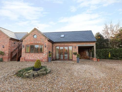 Фотографии гостевого дома 
            Honeypot Cottage, Tarporley