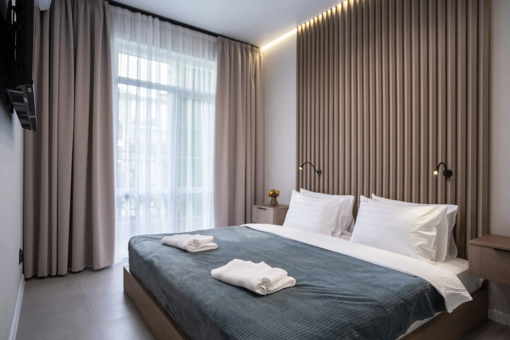 Фотография квартиры Апартаменты RED APARTMENTS Арт Лайт Сити апартамент Армстронг