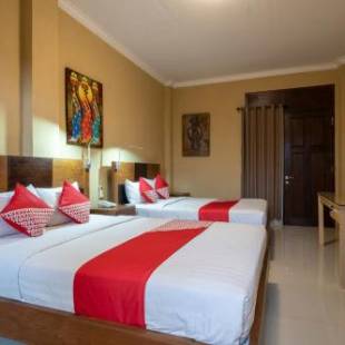 Фотографии гостиницы 
            OYO 612 Dante Guesthouse