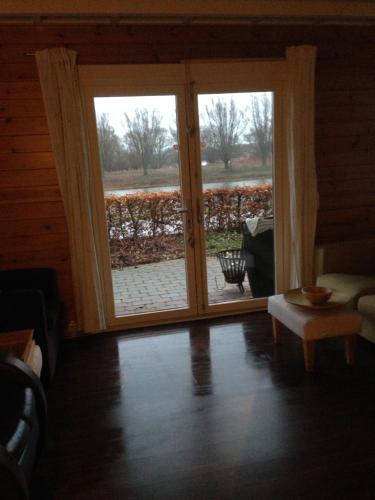 Фотография гостевого дома Thuiskomen, genieten aan het water