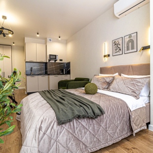 Фотография квартиры Квартира Уютная Студия Рядом с Парком Галицкого и Стадионом OZON Арена