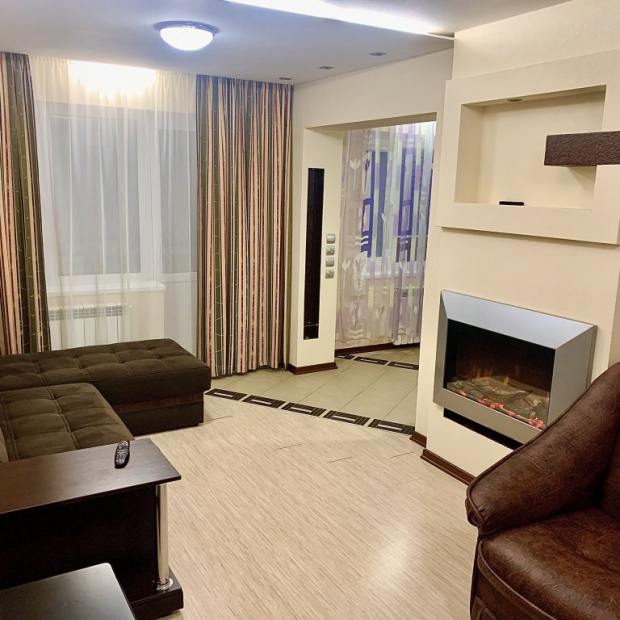 Фотографии квартиры 
            Апартаменты 4-комнатные с камином Квартиркинъ на Гагарина 9