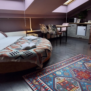 Фотография квартиры Апартаменты Мансарда для семьи или компании