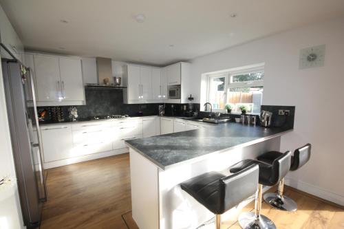 Фотография гостевого дома Four Corners Holiday Home Hot & Sauna