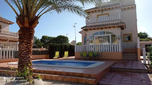 Фотографии гостевого дома 
            Los Dolses Don Juan,villa avec piscine privée
