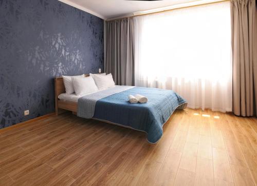 Фотографии квартиры 
            Scandinavian Poltava Apartments with 2 rooms, 3 beds 1 sofa