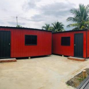 Фотографии гостевого дома 
            Padang Besar Red Cabin Homestay