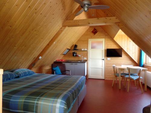 Фотография мини отеля B&B en Vakantiehuisje Ursula