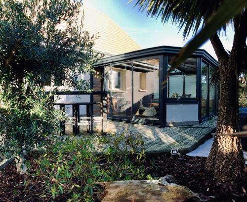 Фотография гостевого дома Les Palmiers gite 7 personnes plages du débarquement