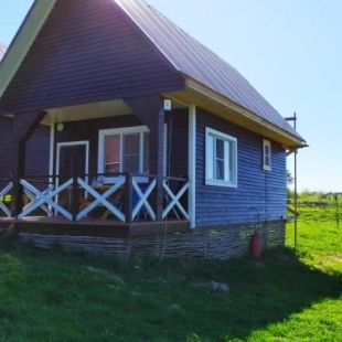 Фотография гостевого дома Дом С причалом на берегу