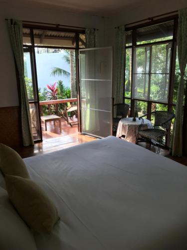 Фотография гостевого дома Mali House