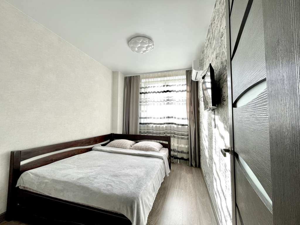 Фотография квартиры Двухкомнатная квартира сети "PanApartments" с панорамным видом на город