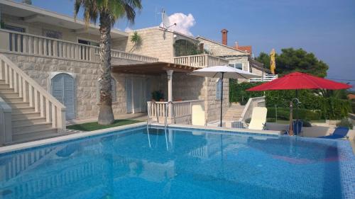 Фотография гостевого дома Seaside luxury villa with a swimming pool Puntinak, Brac - 2964