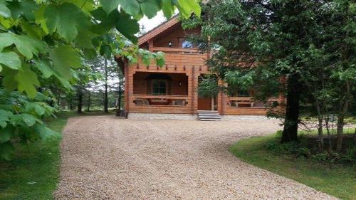 Фотография кемпинга Forest Lodge Log Cabin - Ireland