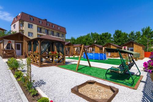 Фотография гостевого дома Домики Люкс