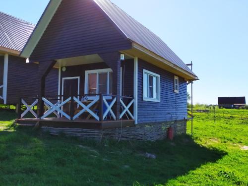 Фотографии гостевого дома 
            Дом С причалом на берегу