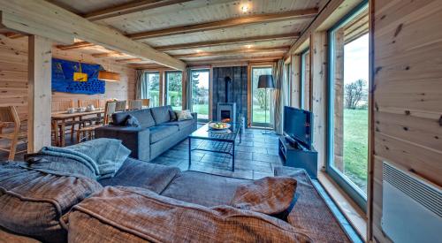 Фотография гостевого дома traumHaff Küstenchalets - einzigartige Chalets an der Ostsee. Ganz aus Lärchenholz mit Kamin und Sauna