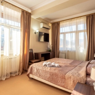 Фотография квартиры Квартира Номер в Отеле с Балконом Шикарным Видом на Горы