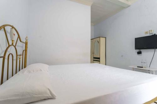 Фотография гостиницы RedDoorz Plus @ Puncak Mas Cottage